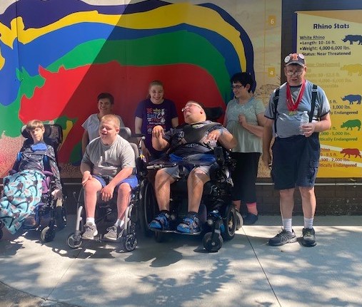 Group at Zoo with mural Sept 2021
